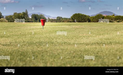 red markers on golf course